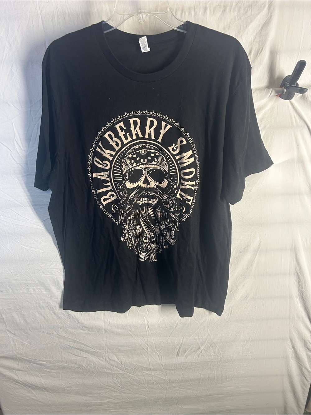 Bella Canvas Black Short-Sleeve Graphic Tee with Cream Skull Design